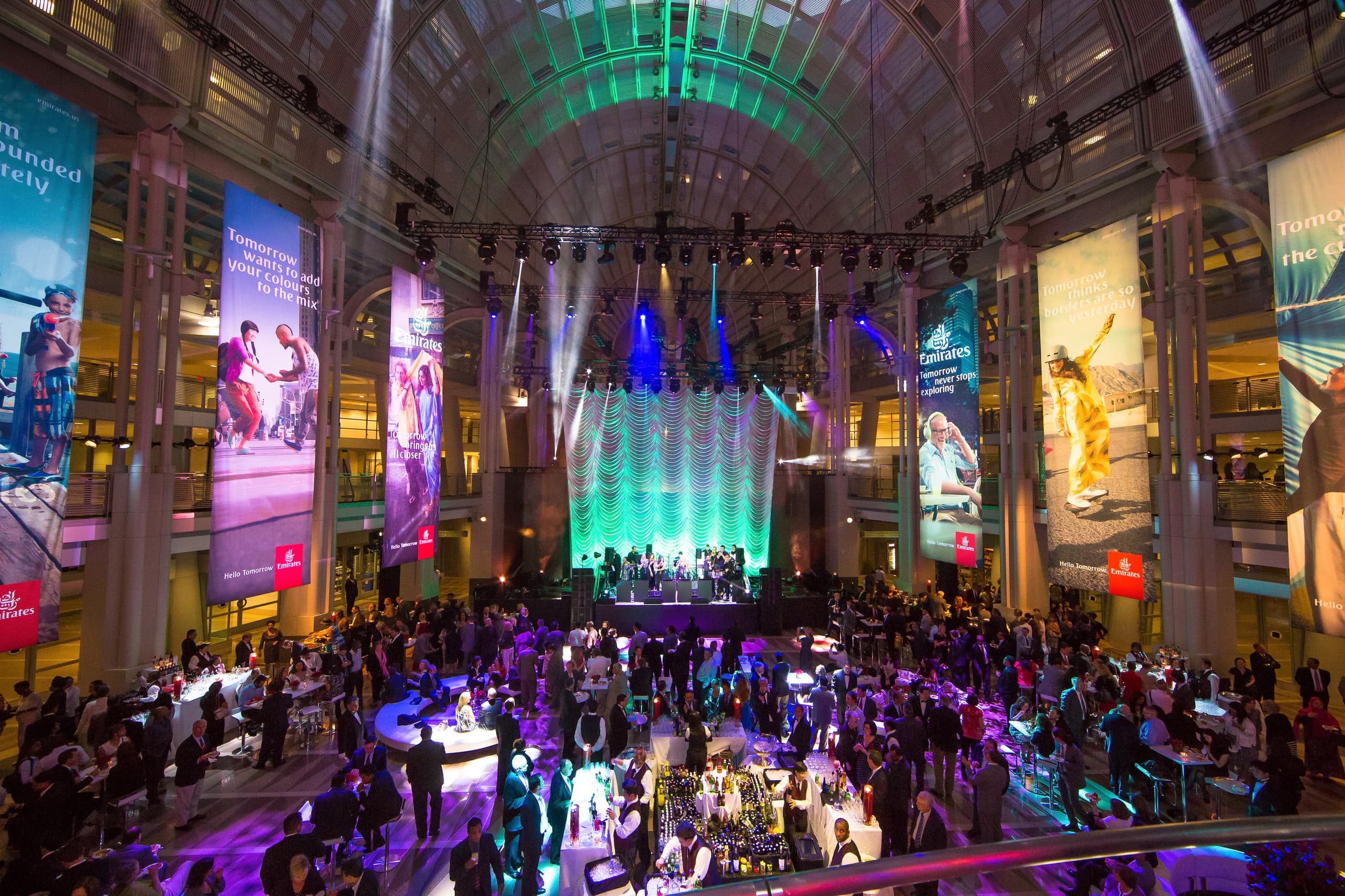 A grand gala with dramatic stage lighting, photographed by DC Events Inc.